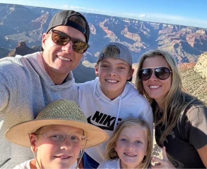 Dr. Kevin O'Neill with his family outdoors